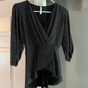 Black, sparkly boutique top. Flattering fit.